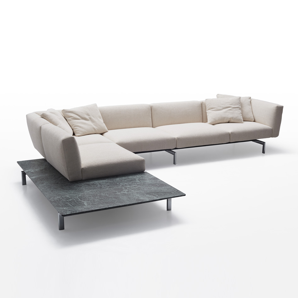 Avio Sofa System, designed by Piero Lissoni, is a contemporary and versatile sofa component system with a solid and elegant design.
